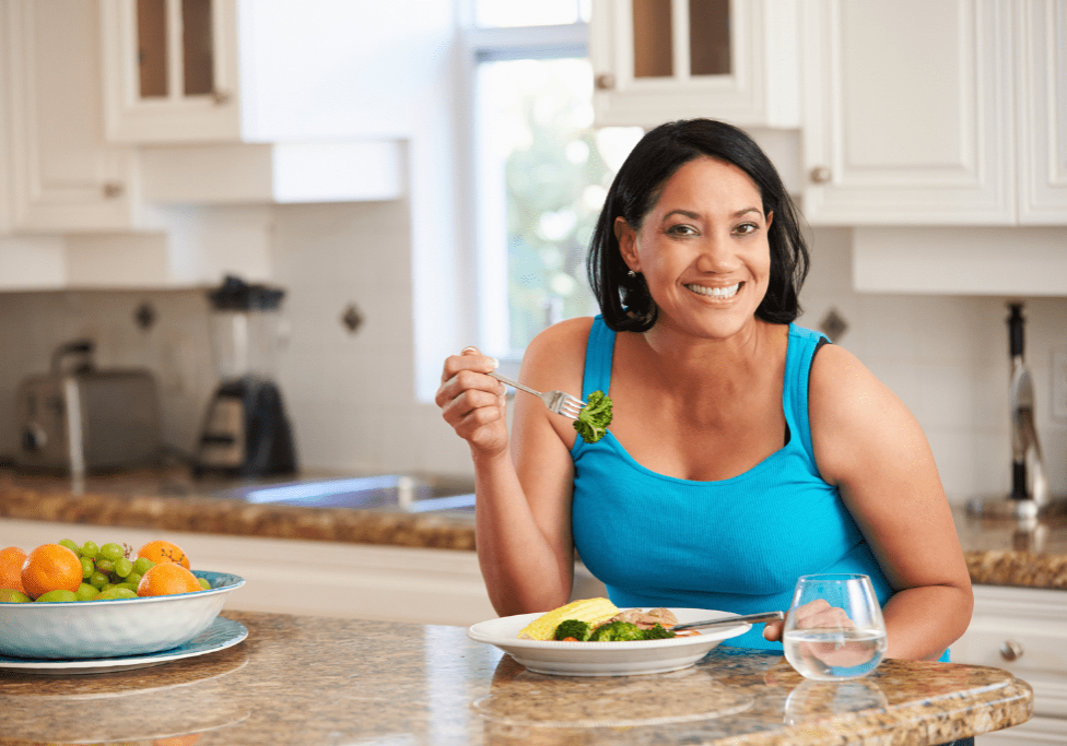 woman eating veggies