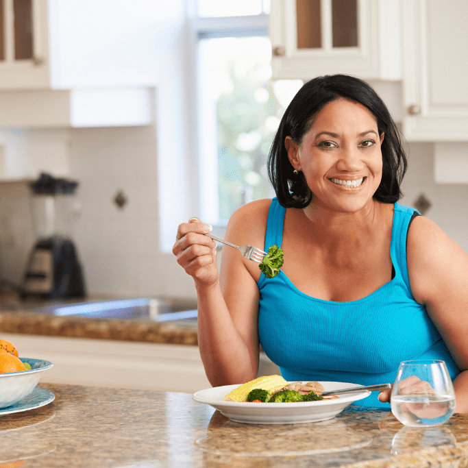 woman eating veggies woman eating veggies